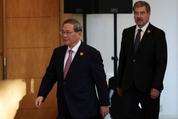 China's Li criticises tariffs as record trade surplus irks export markets